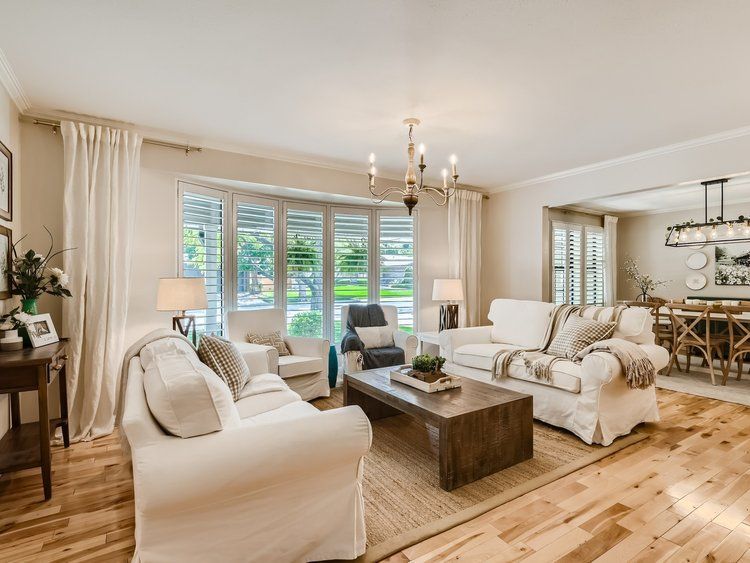 After Interior Design of Living Room. Updated decor and furniture. Functional room layout. Modern coastal cottage style.