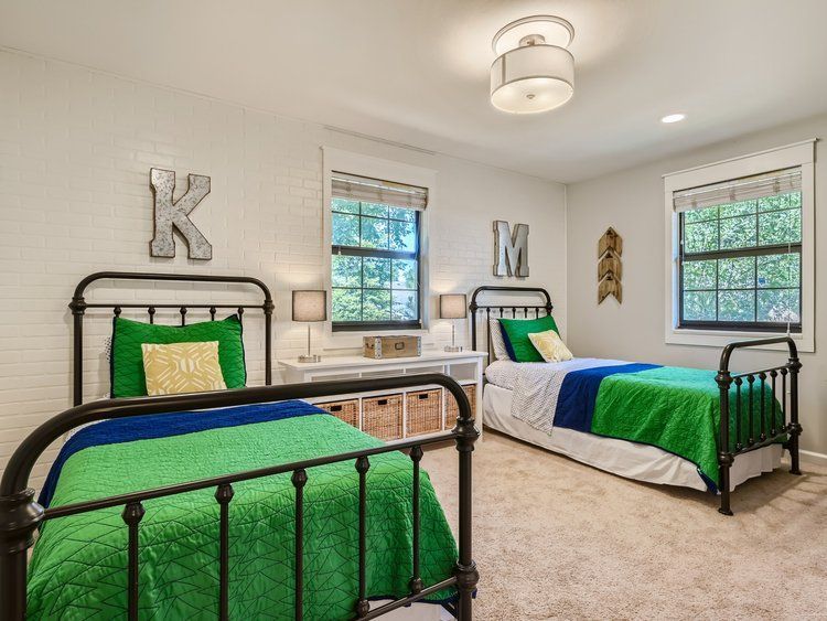 After Image of Boys Bedroom with double twin beds and faux brick wall