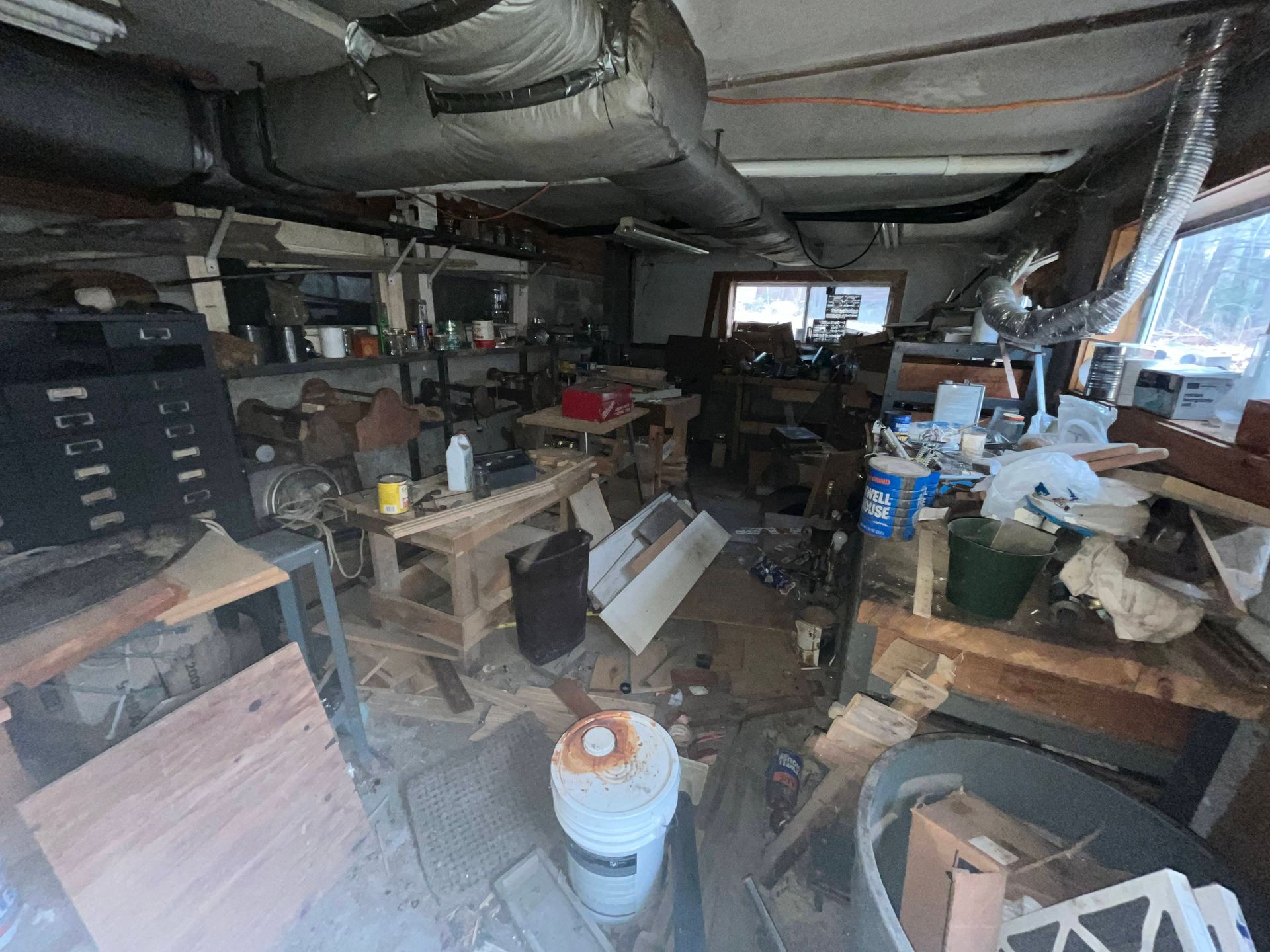 Basement in need of local junk removal services in Concord, NH | Junk in R Trunk