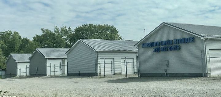Woman Storing Her Belongings In Self Storage Unit — Trumbull County, OH — Mosquito Creek Storage
