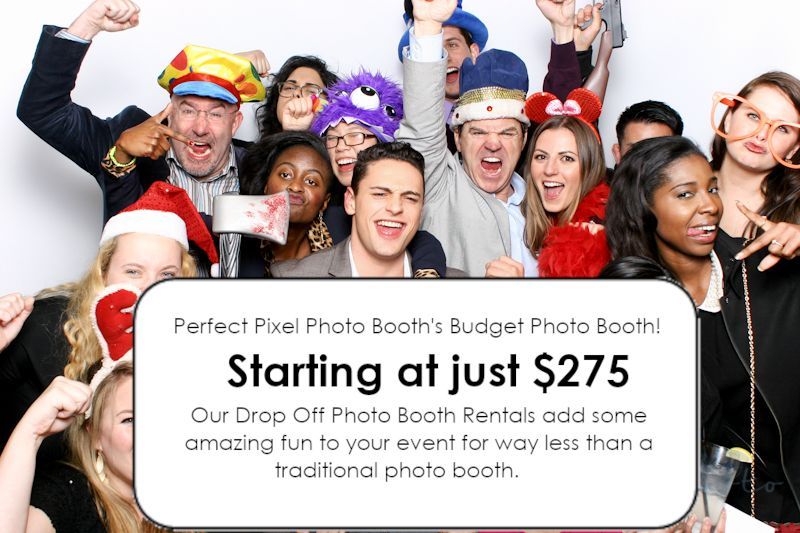 A group of people are posing for a picture in a photo booth.