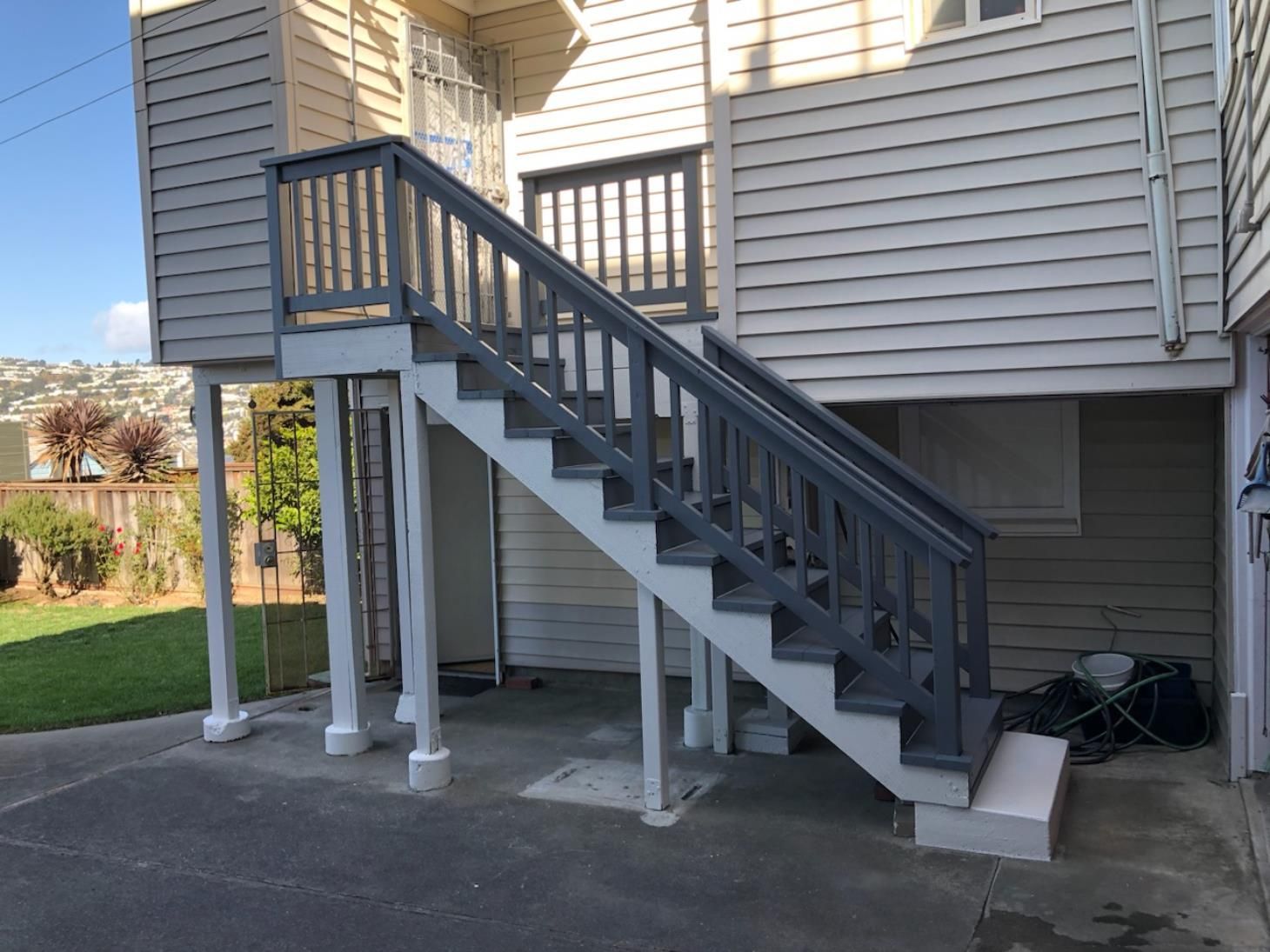 A set of stairs leading up to the second floor of a house.