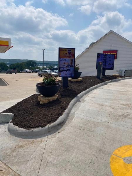 A gas station with a sign that says ' shell ' on it