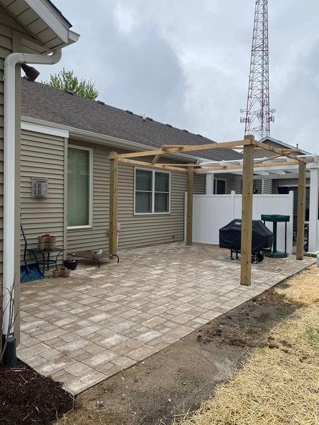 A house with a patio in front of it