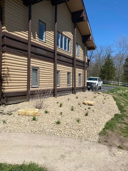 A large house with a truck parked in front of it
