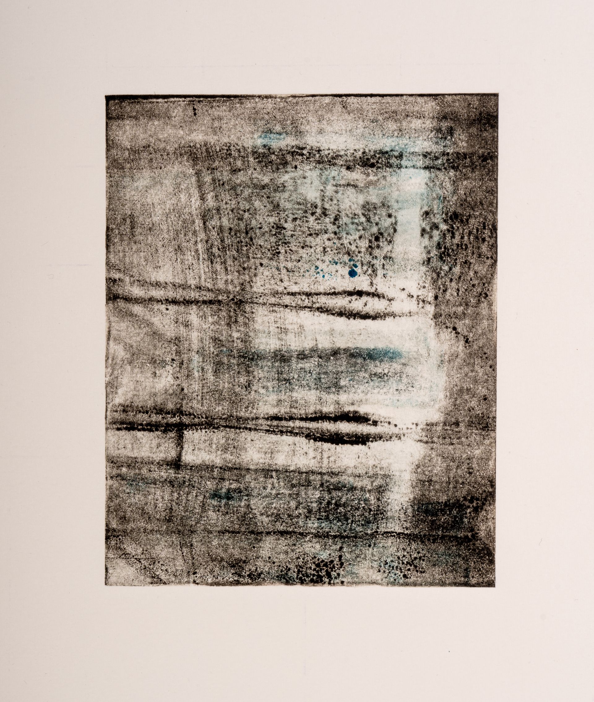 A close up of a painting on a white surface.