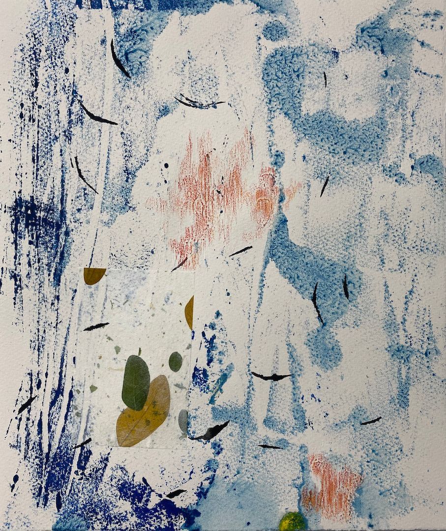 A blue and white painting with leaves on it