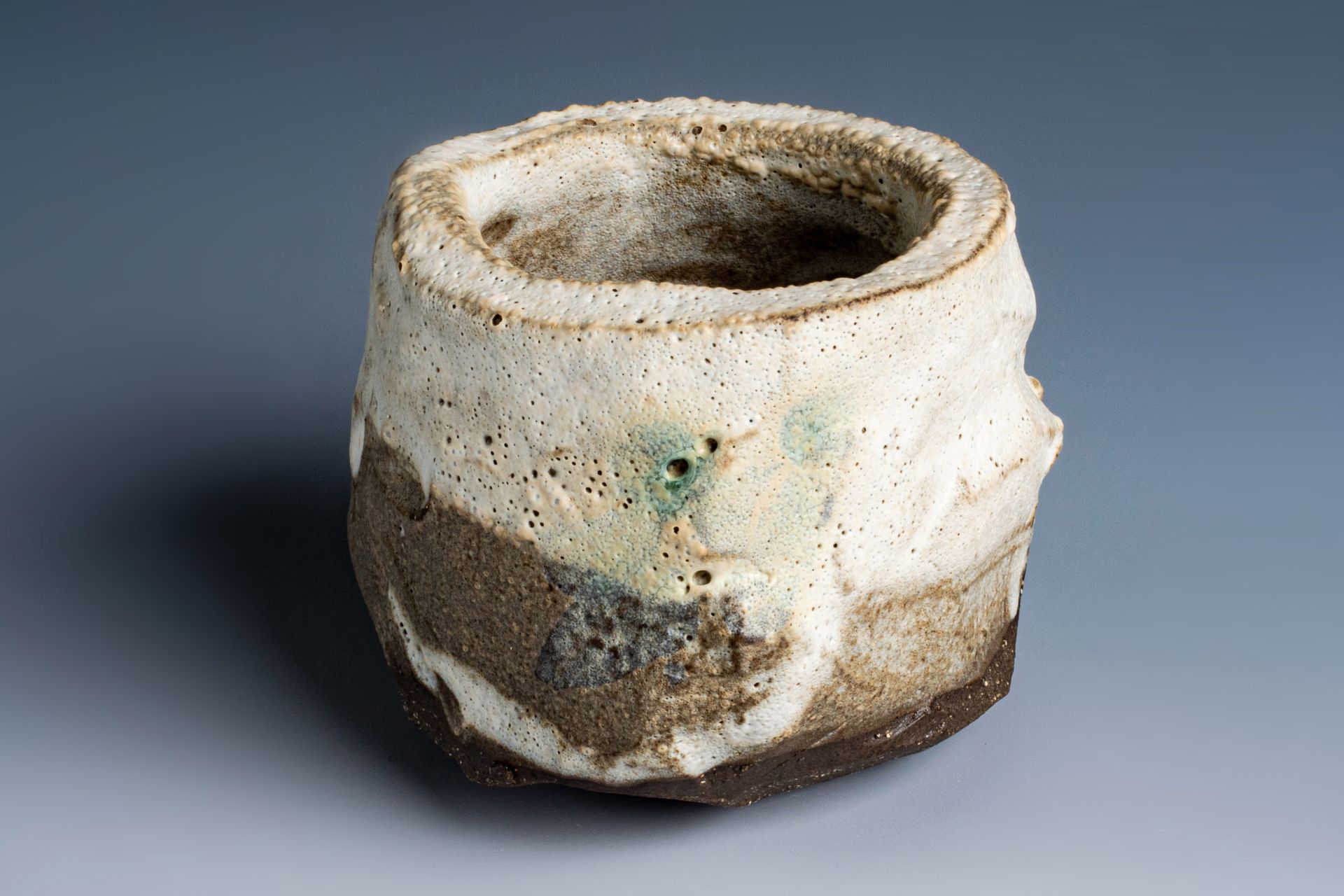 A close up of a ceramic bowl on a table.
