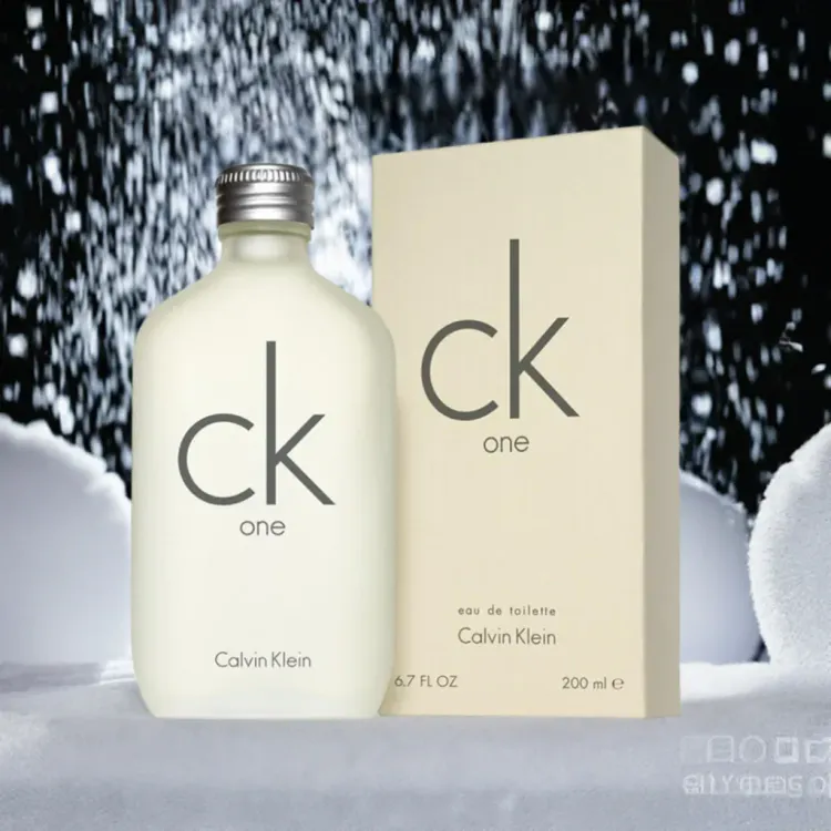 A bottle of ck one perfume next to its box