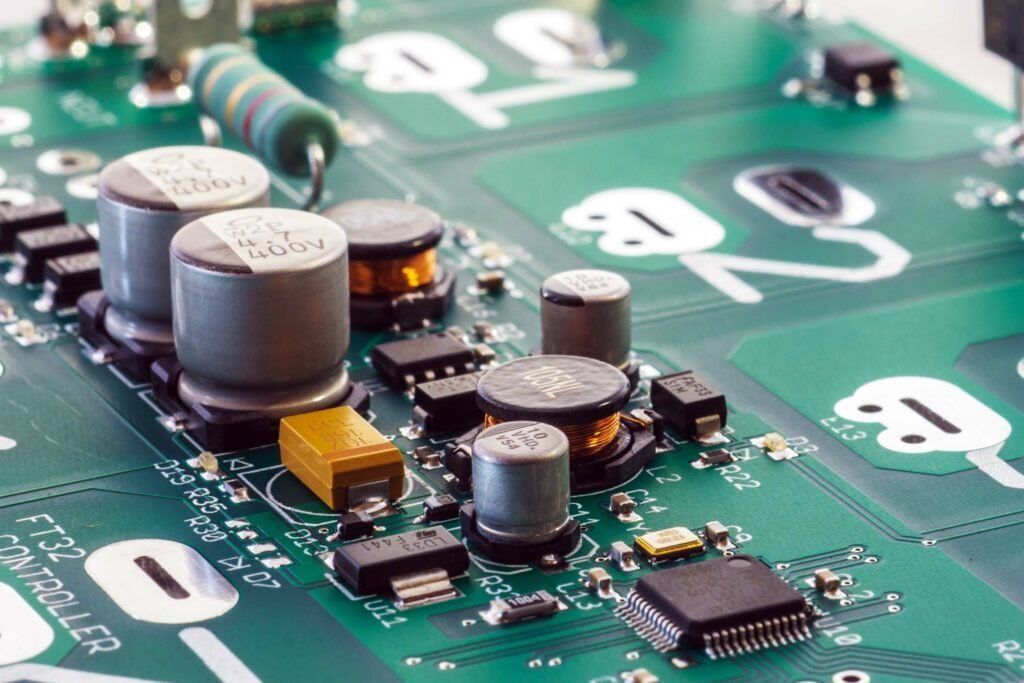 A close up of a motherboard with a lot of components on it