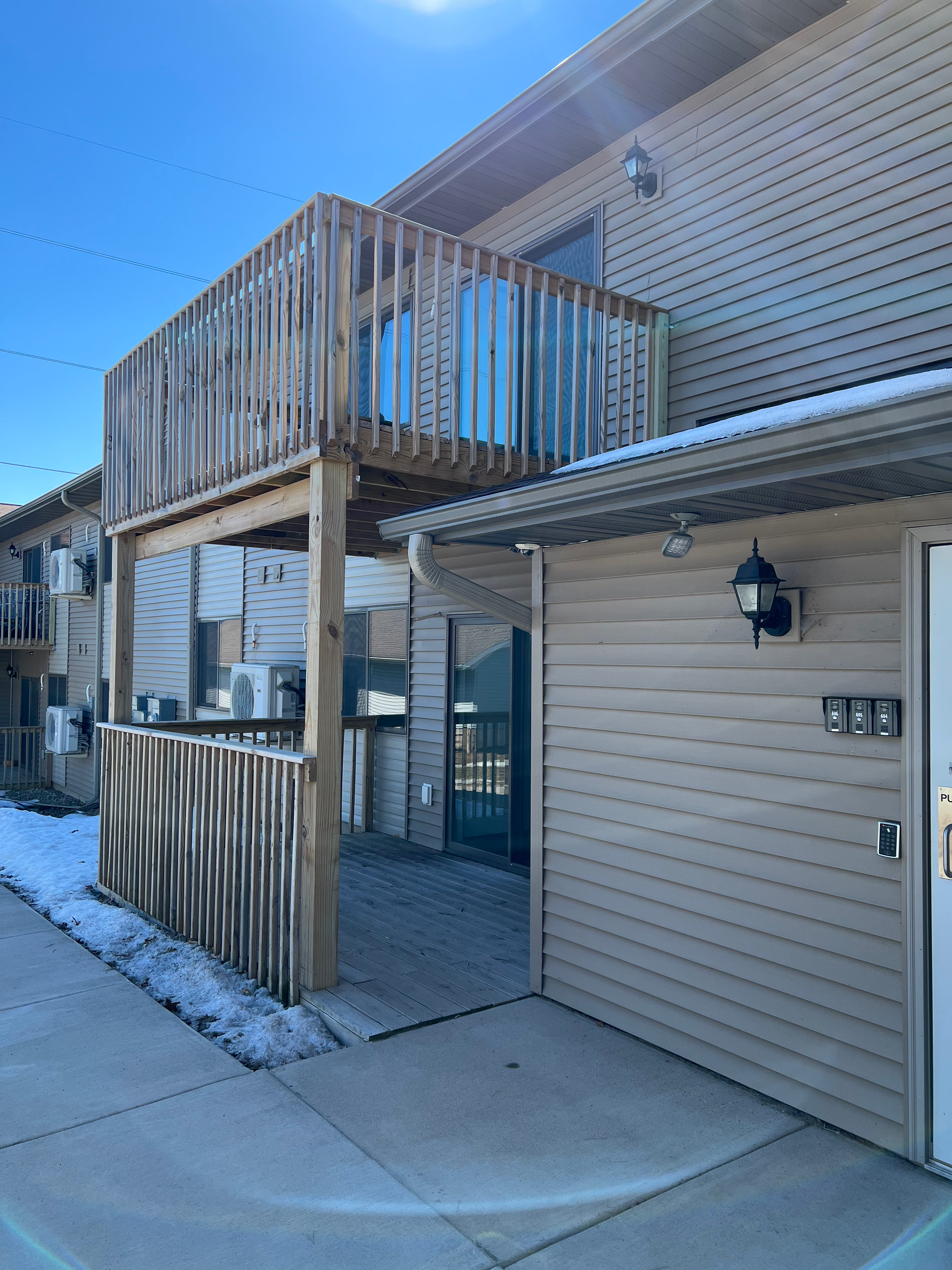 A house with a balcony on top of it