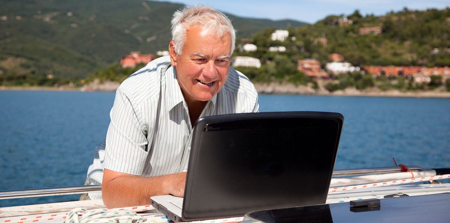 Older man on laptop