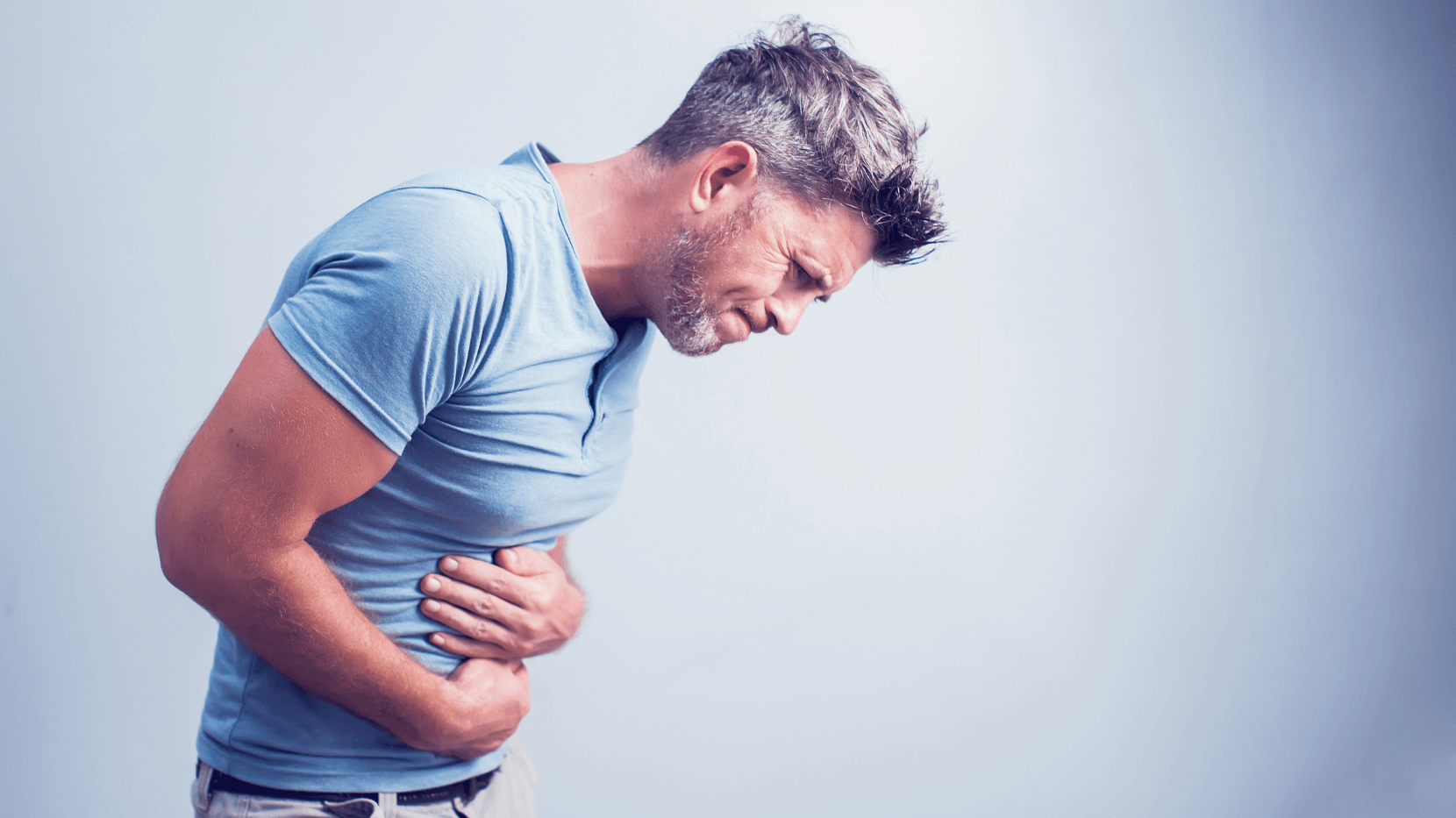 A man experiencing a digestive disorder