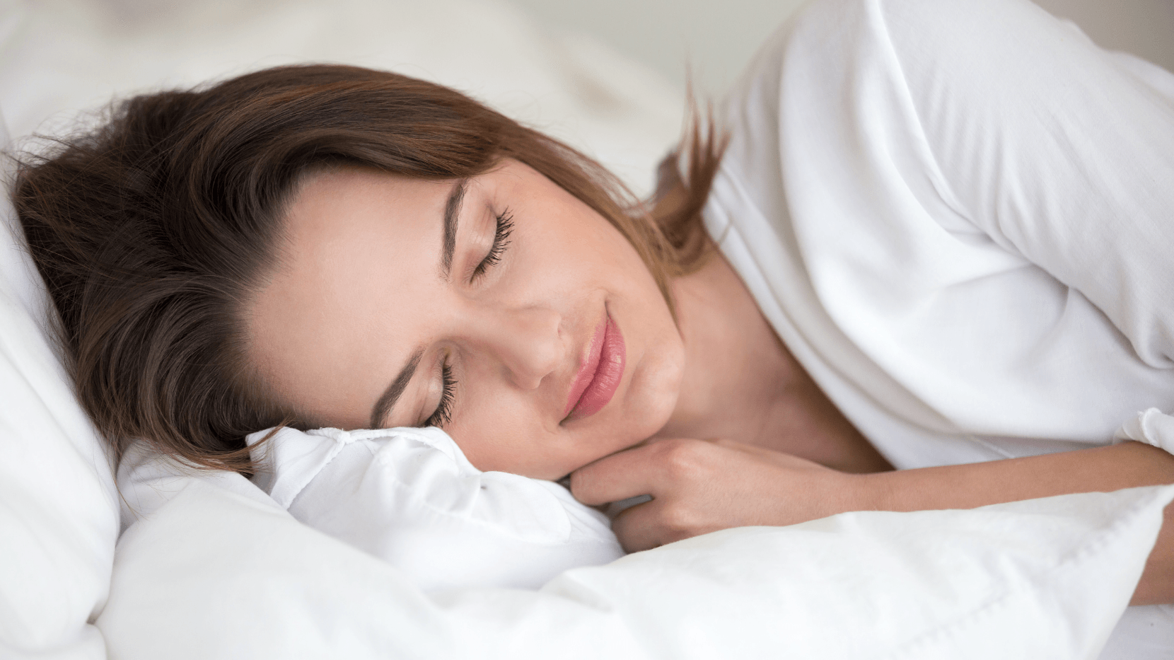 A woman sleeping better because of massage therapy