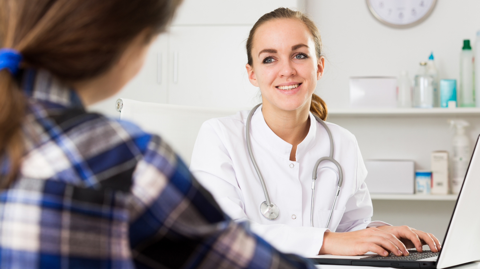 Woman Speaking With Her Doctor About a Pap Test