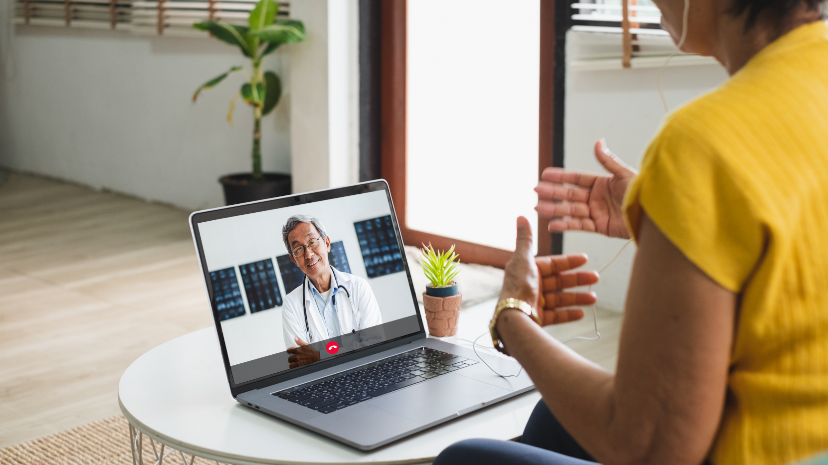 A patient speaking with their doctor on a telehealth call