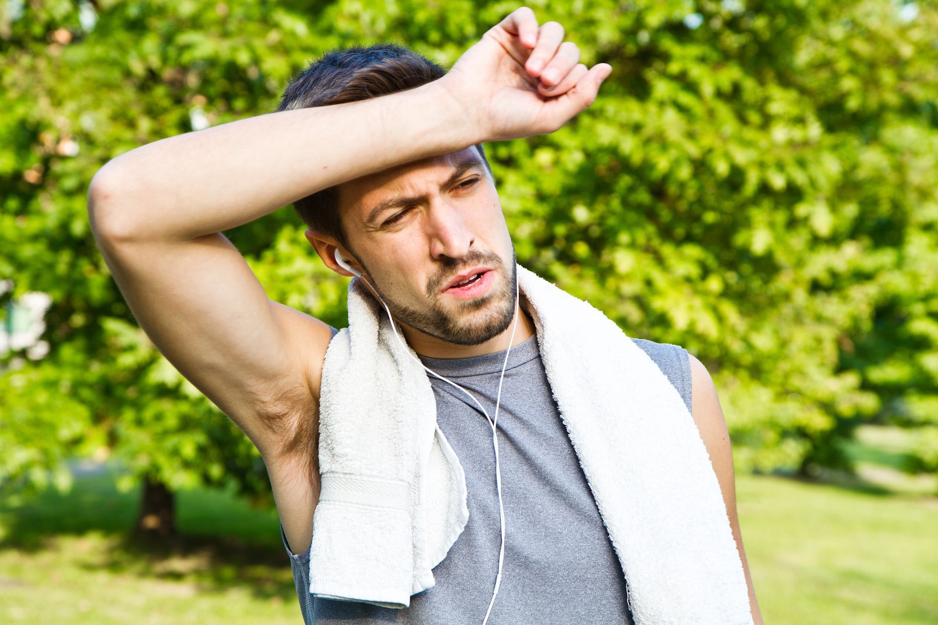 man outdoors under the scorching heat