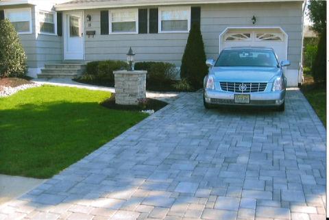 Car Parked in Front of a Garage — Middletown, NJ — Precision Landscape Contractors