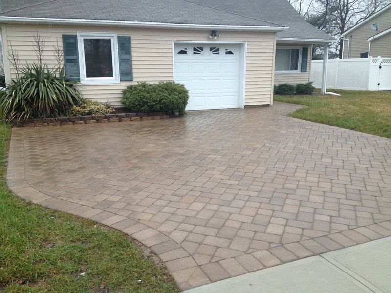 Driveways and White Garage — Middletown, NJ — Precision Landscape Contractors