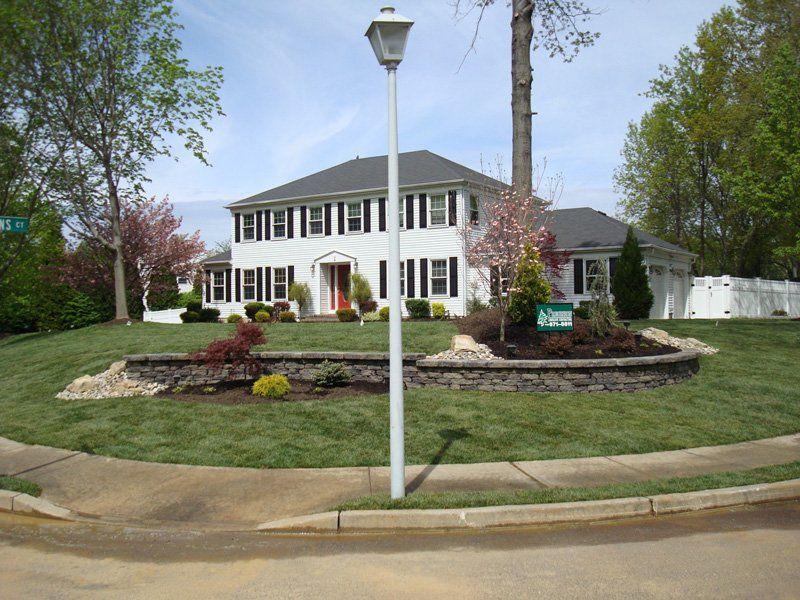 White House with Grass in Front — Middletown, NJ — Precision Landscape Contractors