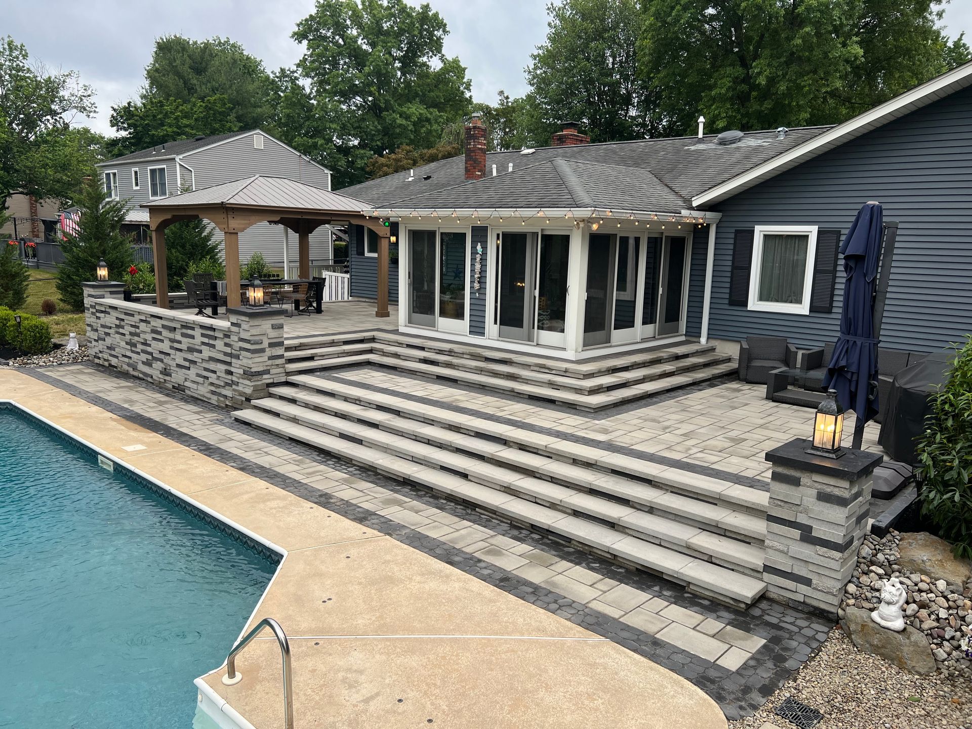 Dark Blue House & Pool — Middletown, NJ — Precision Landscape Contractors