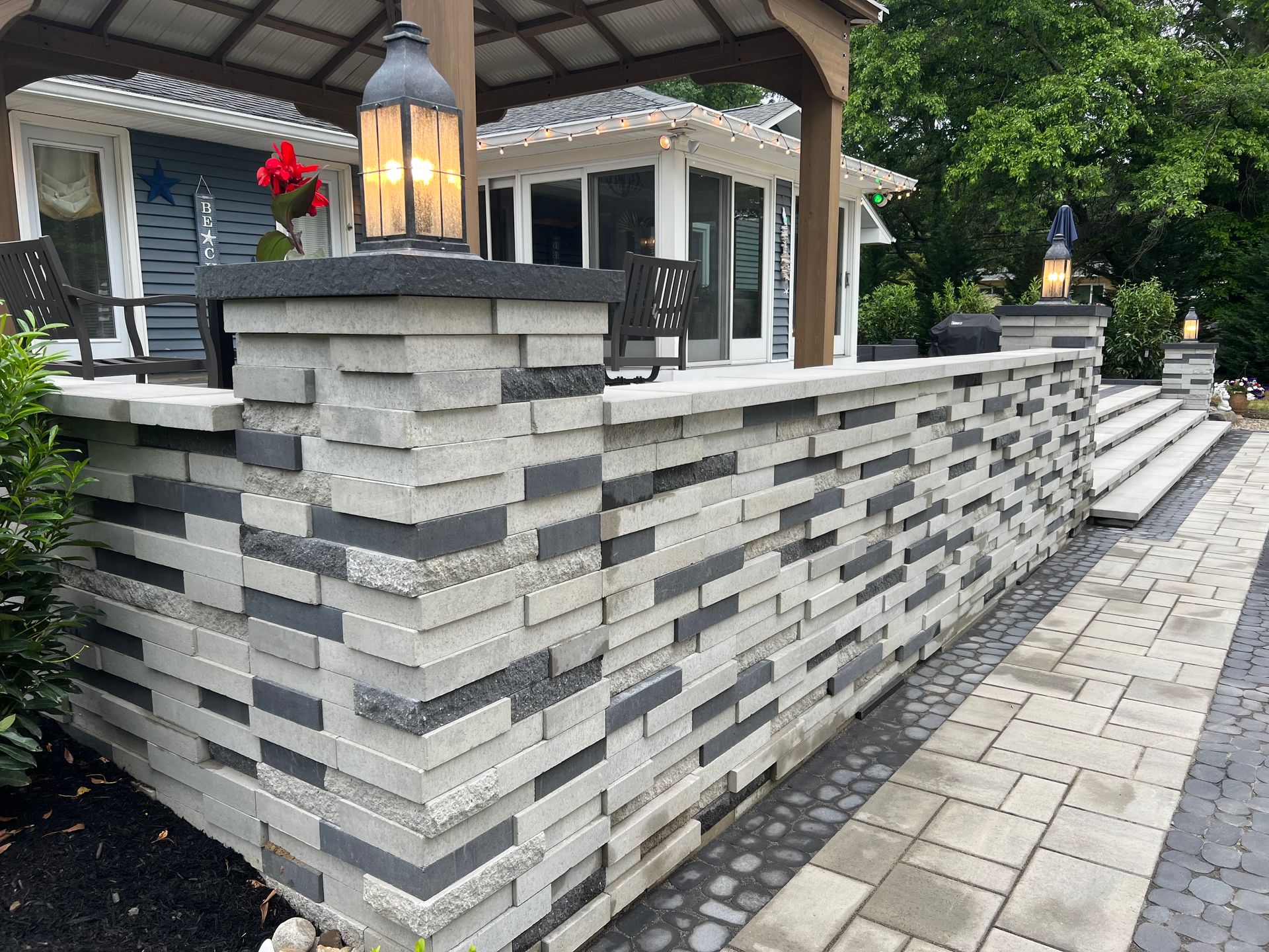 Dark Blue House & Wall — Middletown, NJ — Precision Landscape Contractors