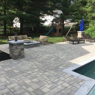 Chairs Beside Swimming Pool — Middletown, NJ — Precision Landscape Contractors