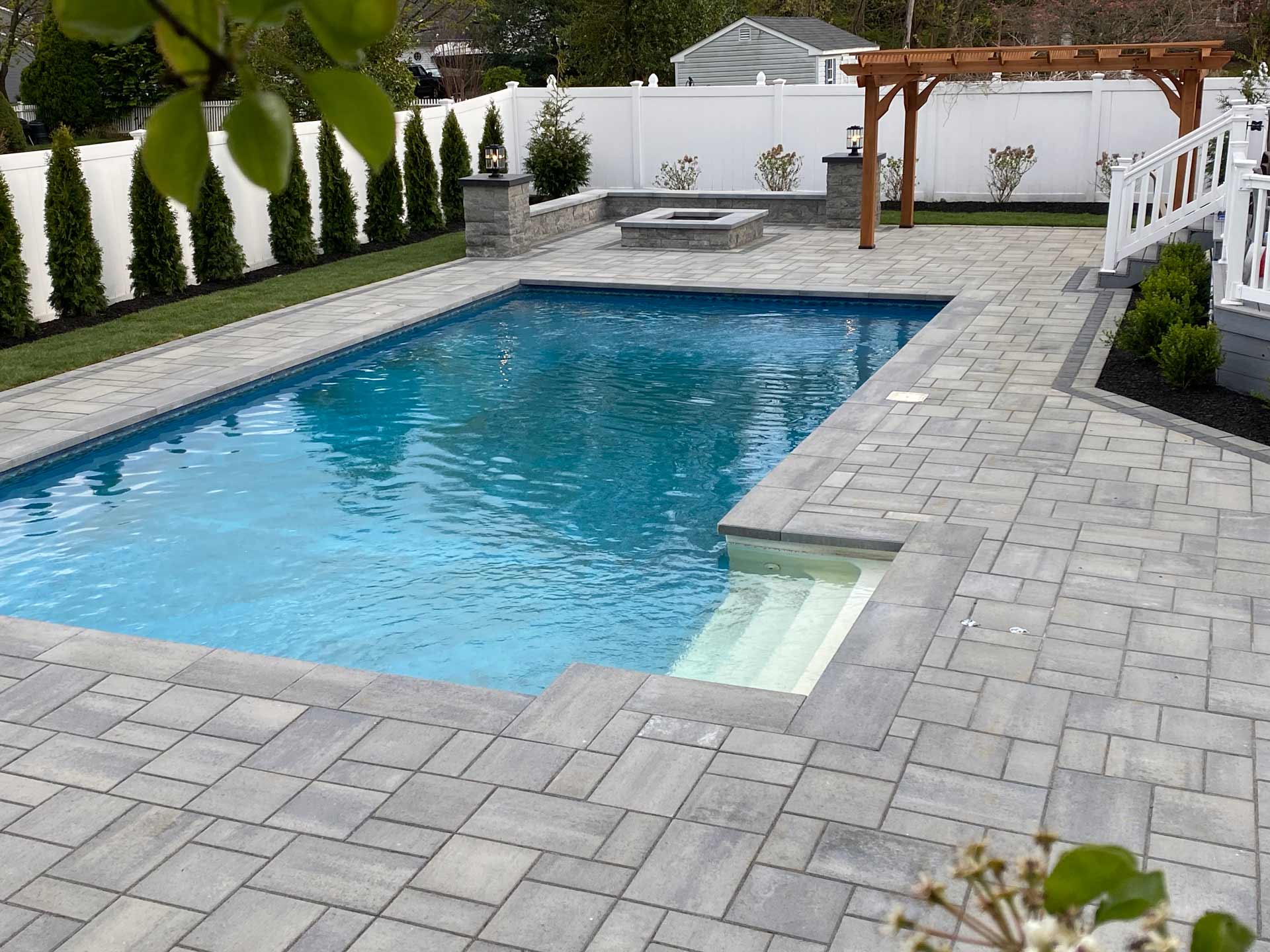 Outdoor Swimming Pool with Plant, Grass, and Tiles — Middletown, Nj — Precision Landscape Contractors