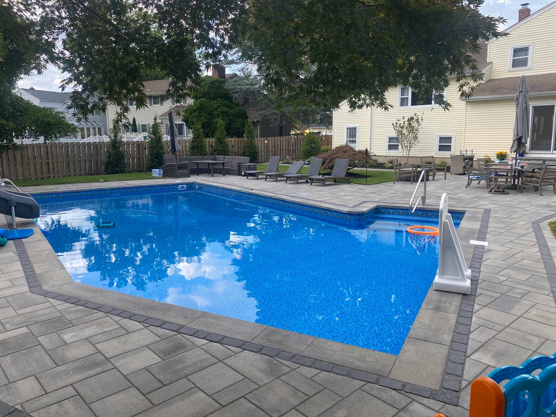 Back Yard with Lounge Chairs and Swimming Pool — Middletown, Nj — Precision Landscape Contractors