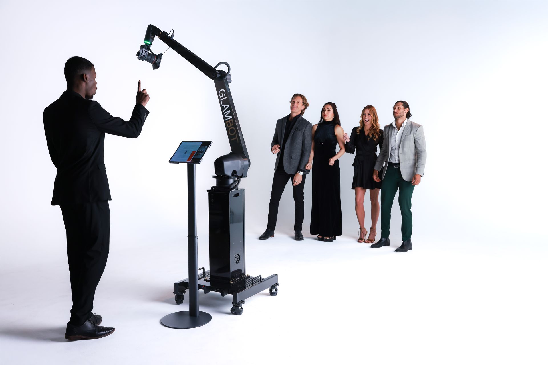 Corporate event attendees enjoying GlamBot cinematic video booth