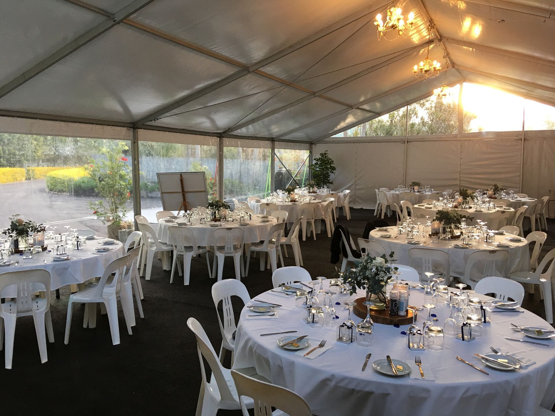 A Large Tent With Tables And Chairs Set Up For A Wedding Reception – Caboolture, QLD - R & R Hire Services