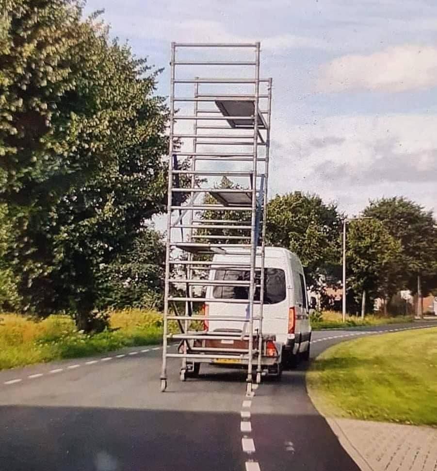 A White Van With A Ladder Attached To The Back Of It – Caboolture, QLD - R & R Hire Services