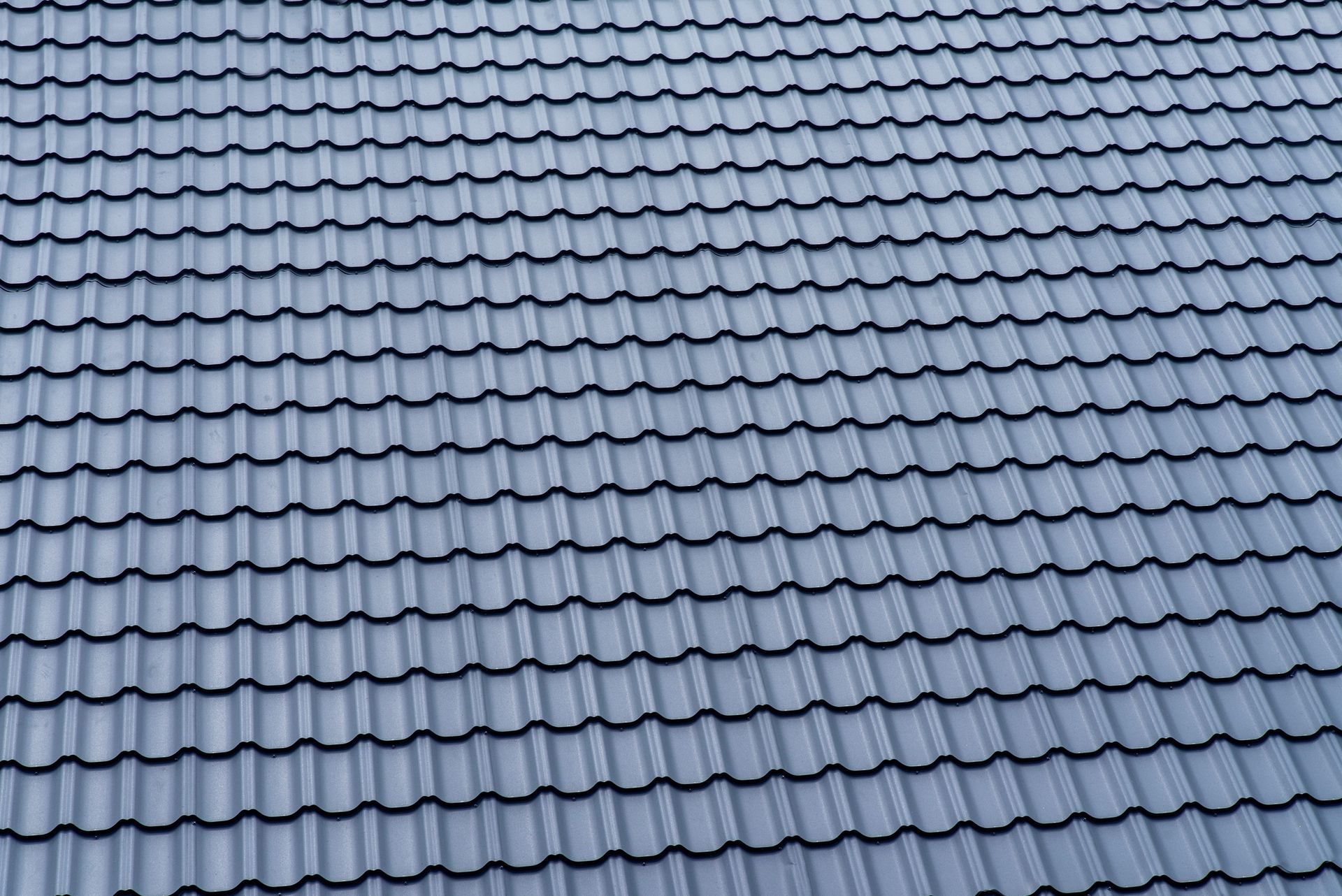 Dark blue tiled roof.