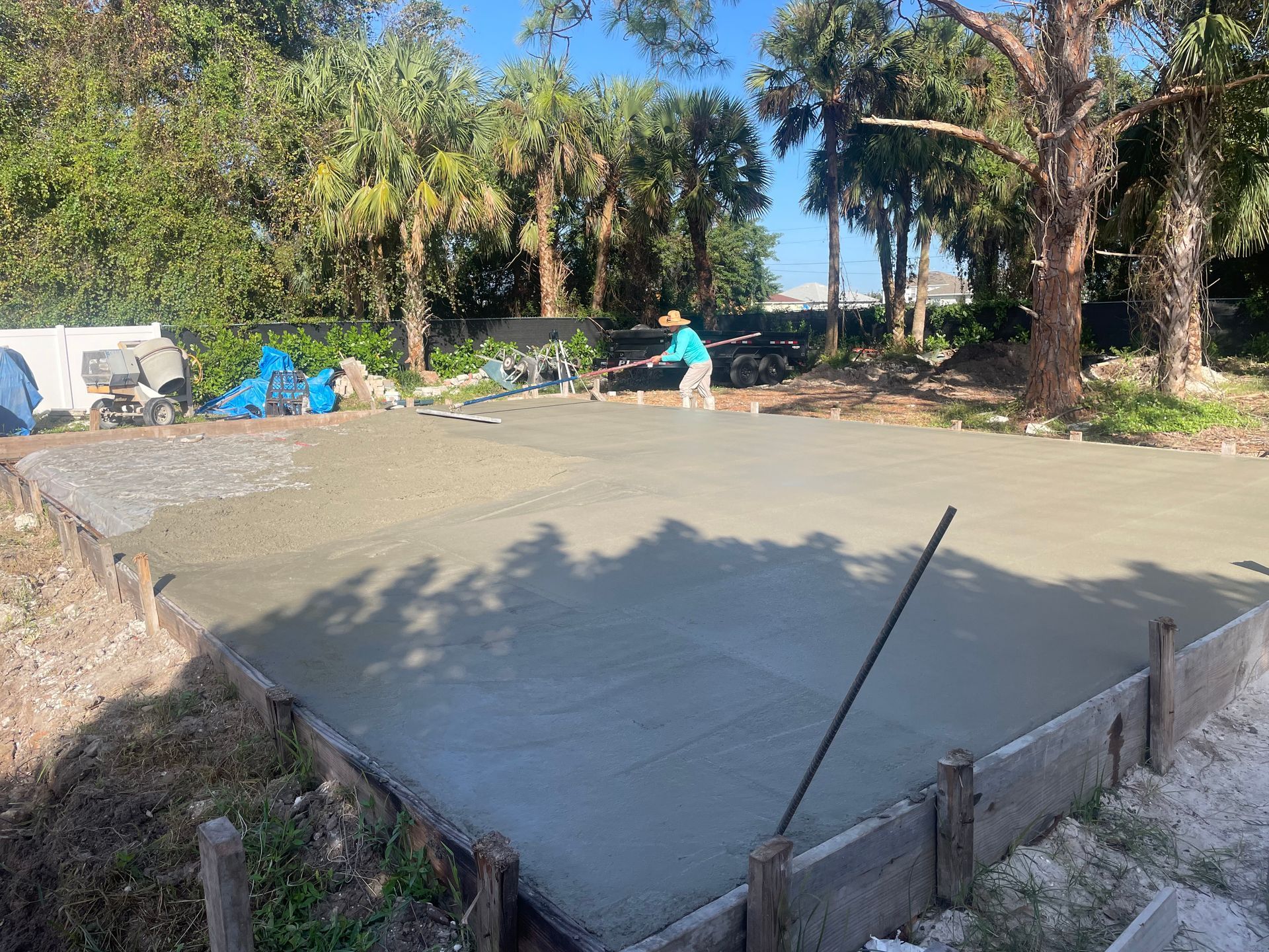 Brick patio with a hot tub on a raised brick platform; outdoor setting.