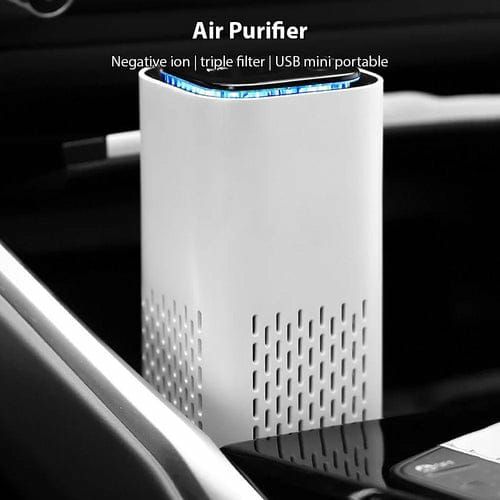 Mini purificador de aire portátil USB blanco con iones negativos y triple filtro.