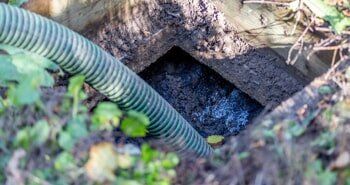 Sewage Clogging — Green Pipe on Sewage in Grantville, GA