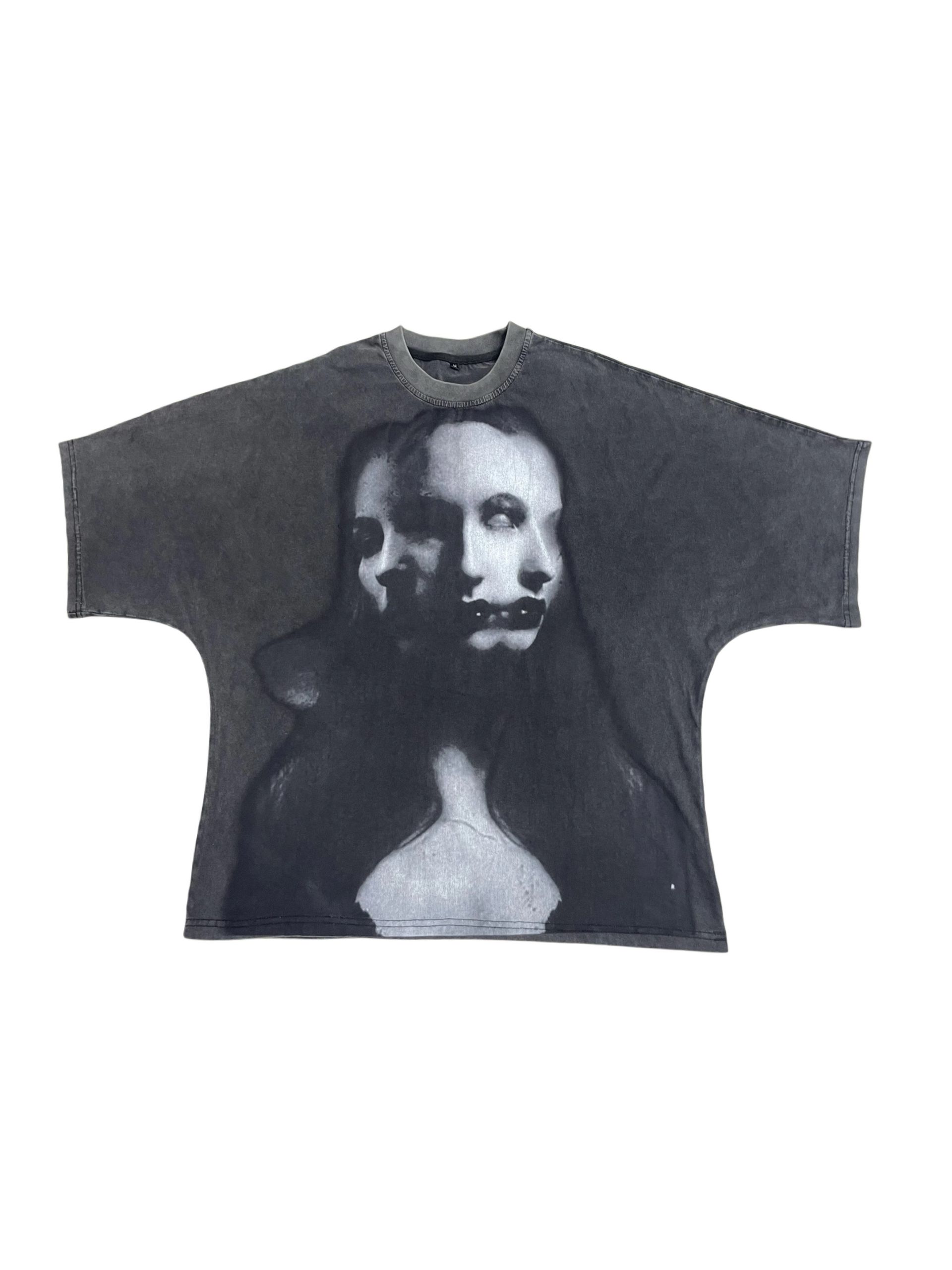 Dark gray t-shirt with a blurred, ghostly portrait of a person's face printed on the front.
