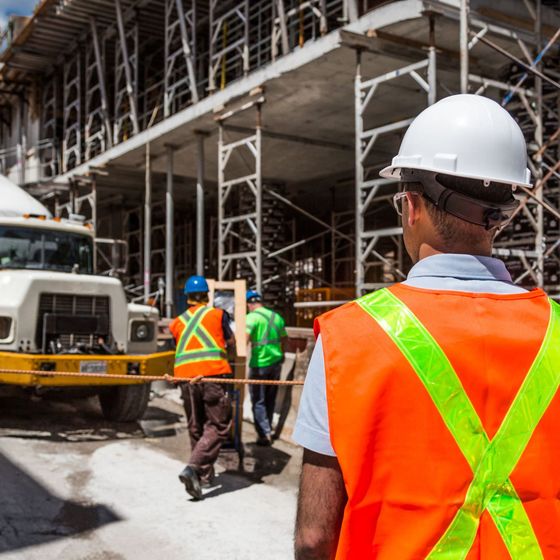 Lake Area Heating and Cooling LLC | A construction worker wearing an orange vest and a hard hat