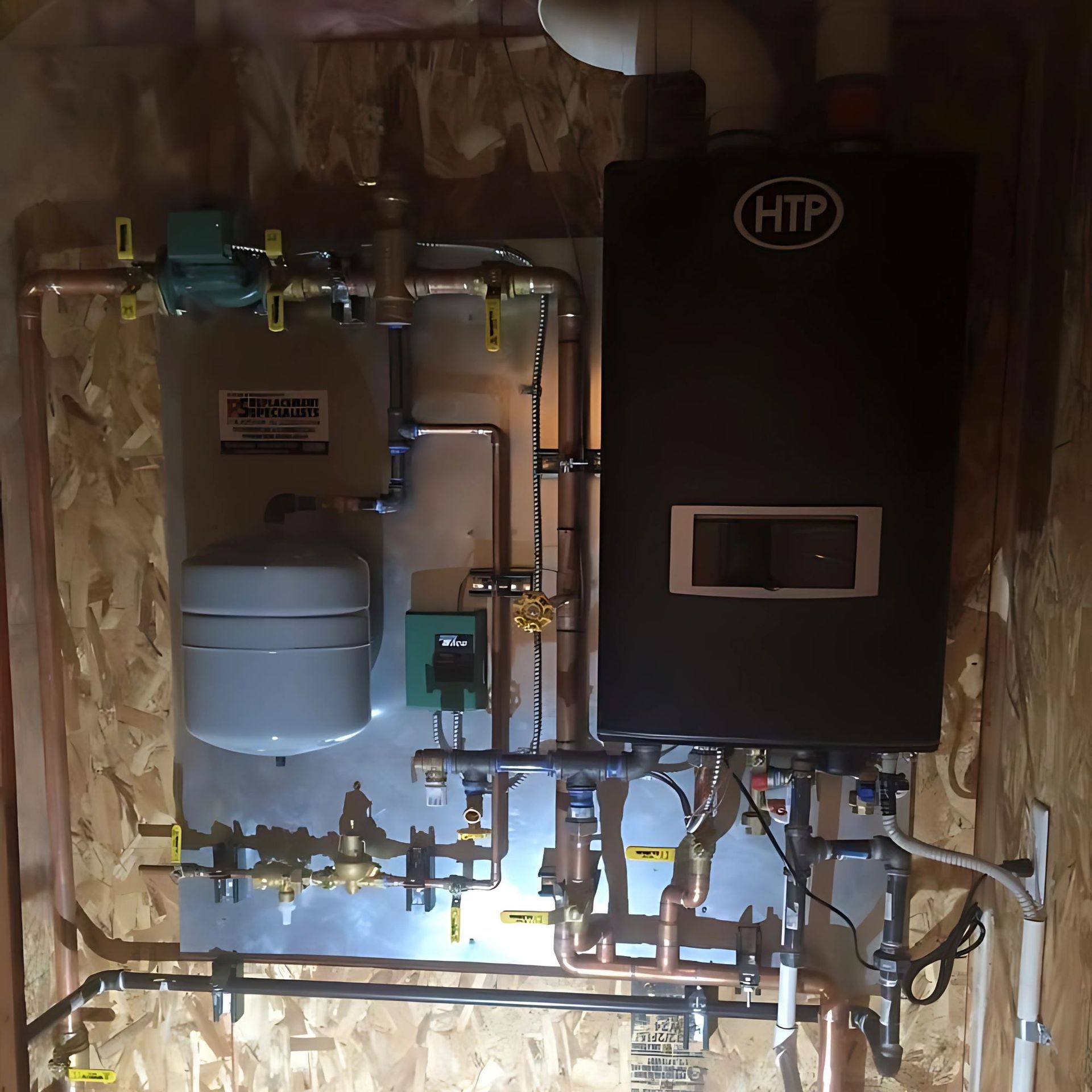 Lake Area Heating and Cooling LLC | A htp water heater is mounted to the wall