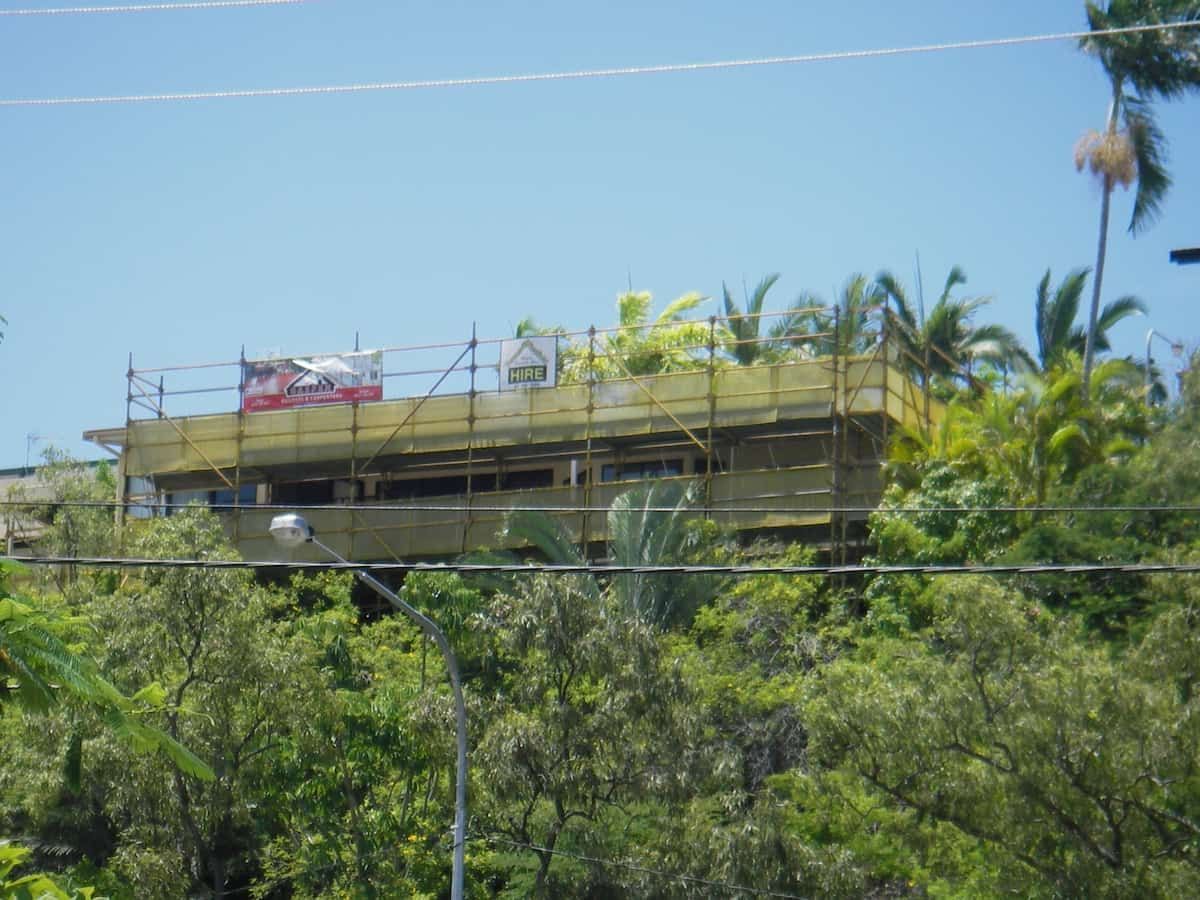 A Balcony With a Railing Between Two Buildings — Gaspen Builders & Carpenters in Kirwan, QLD