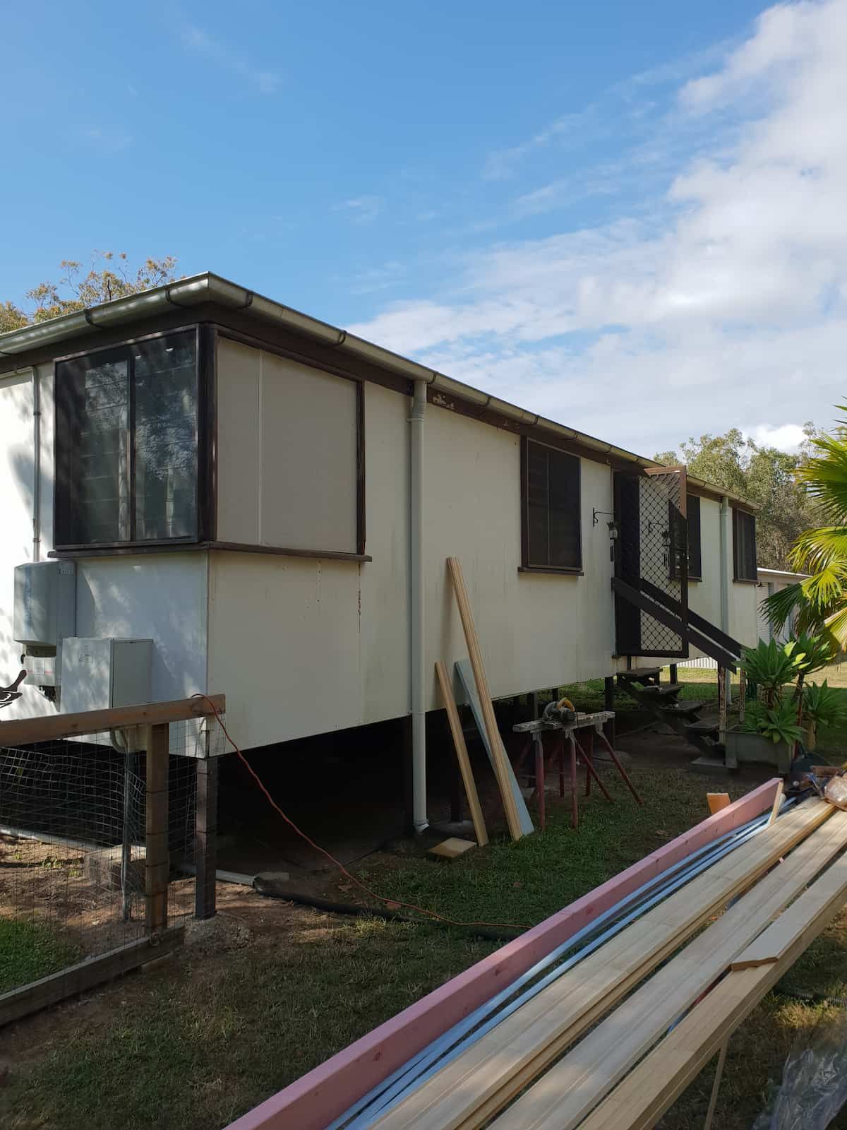 Before a Small White House With a Fence in Front of It — Gaspen Builders & Carpenters in Kirwan, QLD