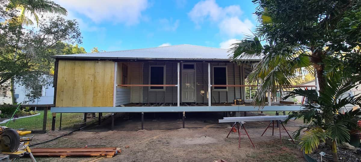 A Small House is Being Built on Stilts in a Yard — Gaspen Builders & Carpenters in Kirwan, QLD