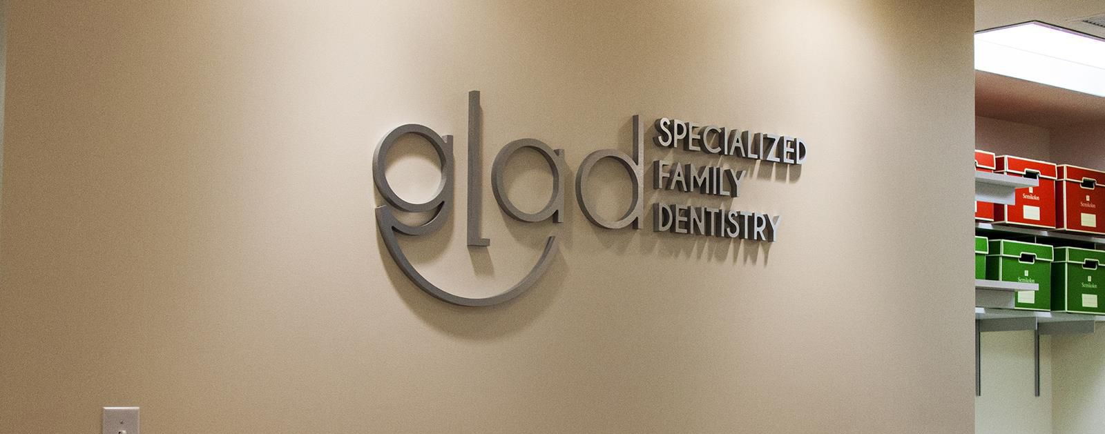 Glad Dentistry logo on the office