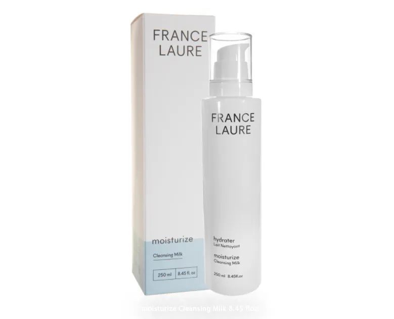 A bottle of france laure next to its box