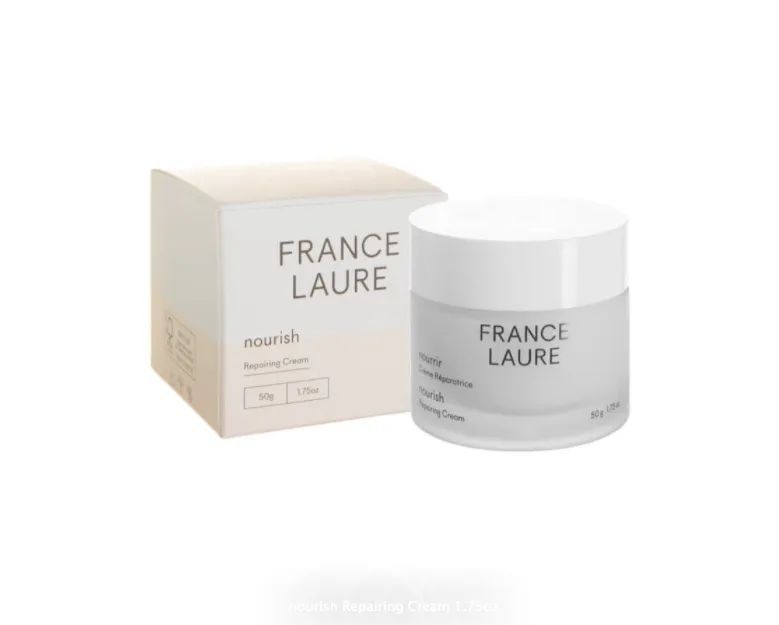 A jar of france laure cream next to a box on a white background.