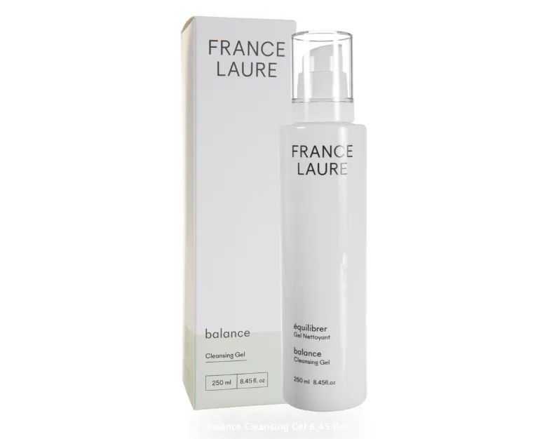 A bottle of france laure balance is next to its box