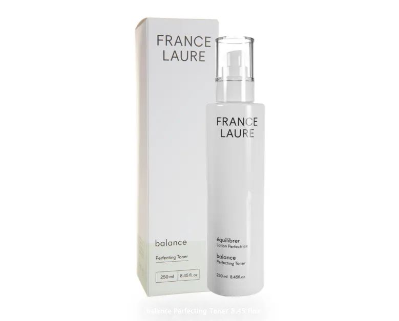 A bottle of france laure balance next to its box