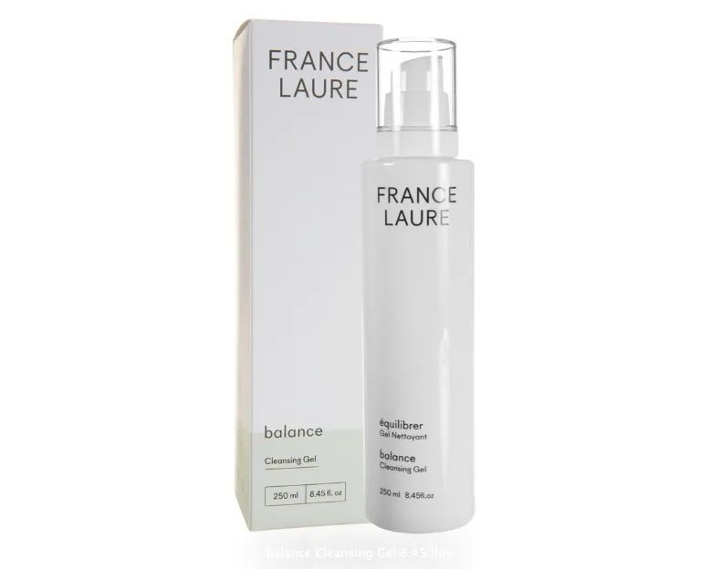 A bottle of france laure balance next to its box