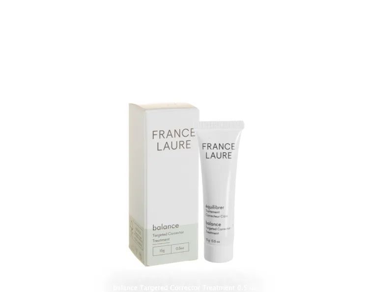 A tube of france laure cosmetics next to a box