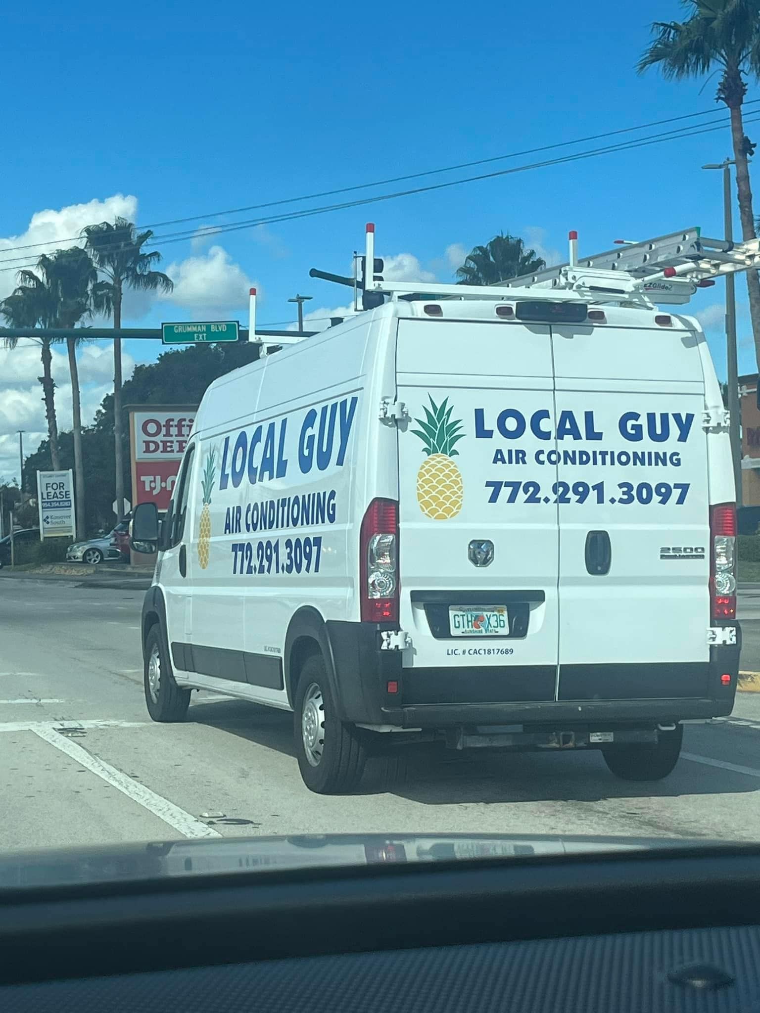An Local Guy van that says local guy on the back